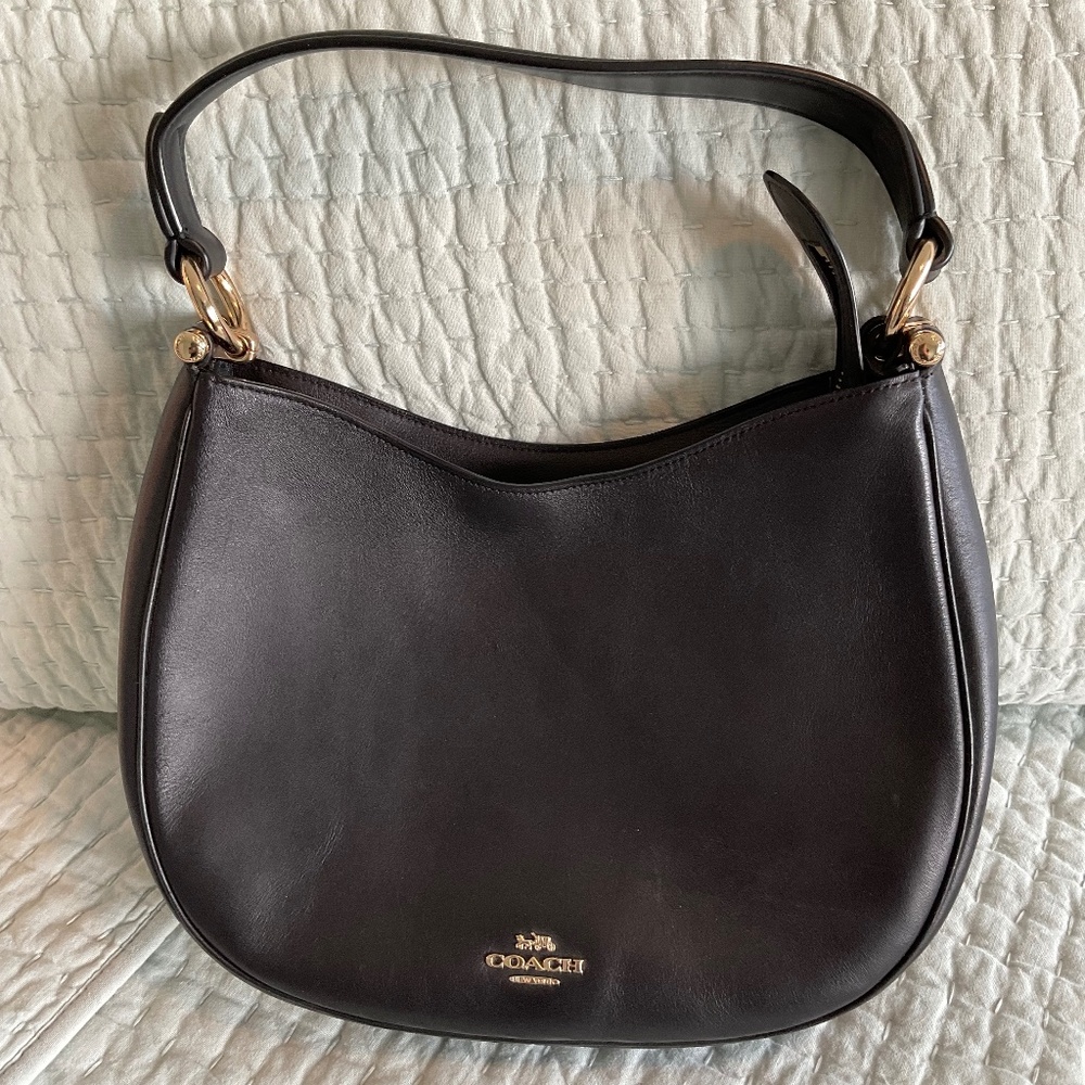 Coach black leather handbag with 2 straps. Beautiful leather interior.